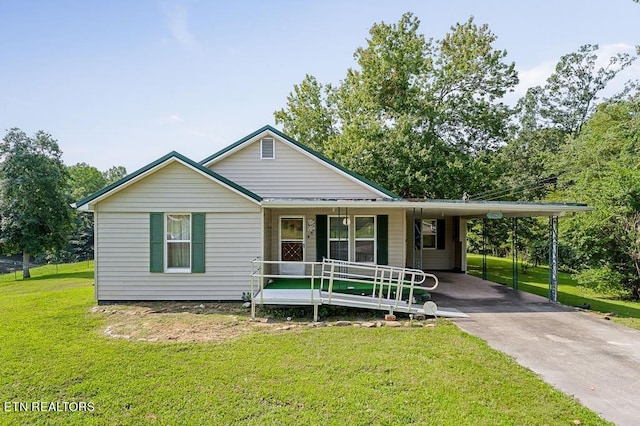 view of front facade featuring a front lawn and a carport