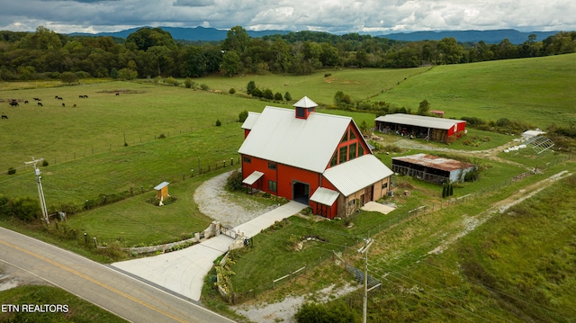 bird's eye view with a mountain view and a rural view