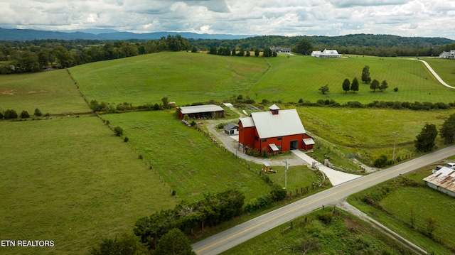 drone / aerial view with a rural view and a mountain view