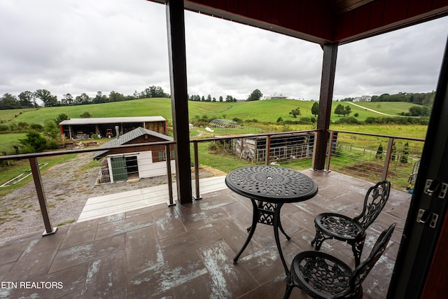 view of patio with a rural view