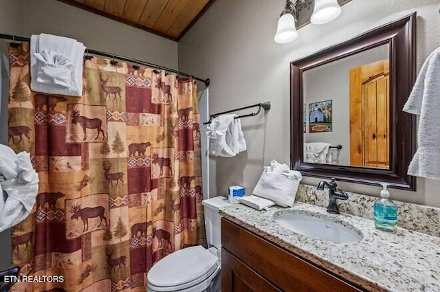 bathroom with vanity, toilet, crown molding, and wood ceiling