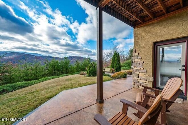 view of patio with a mountain view