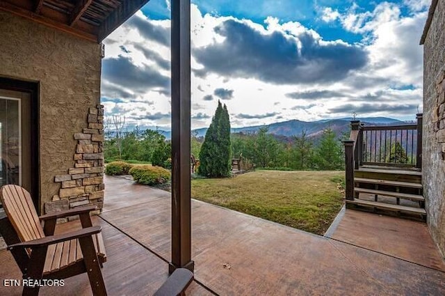 view of patio with a mountain view