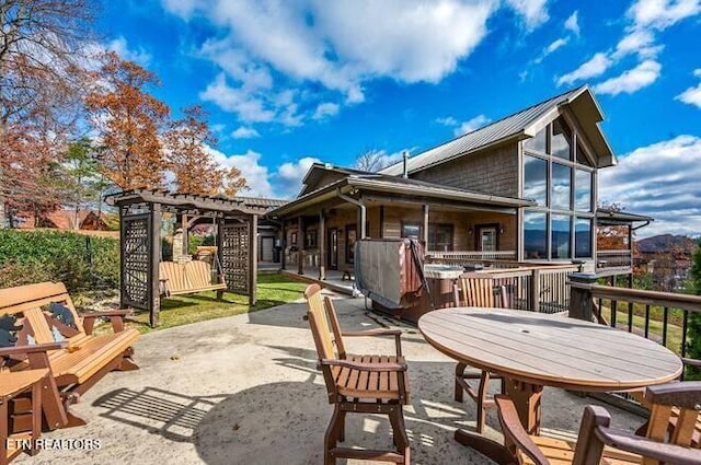 exterior space with a patio area and a pergola