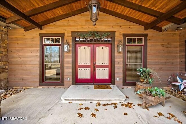 property entrance with covered porch