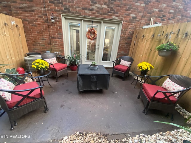 view of patio / terrace with central air condition unit