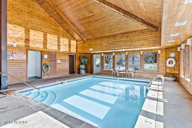 view of pool with a jacuzzi