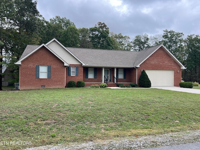 ranch-style house with a garage, central AC, and a front lawn