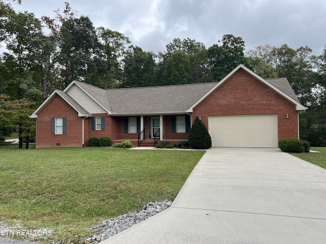 single story home with a garage and a front yard