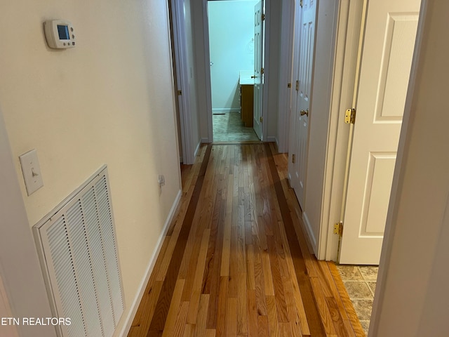 hall featuring light hardwood / wood-style floors