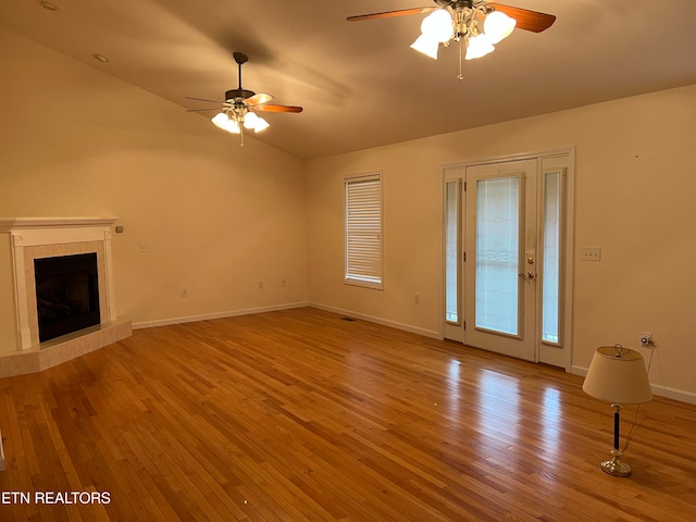 unfurnished living room featuring light hardwood / wood-style floors and ceiling fan