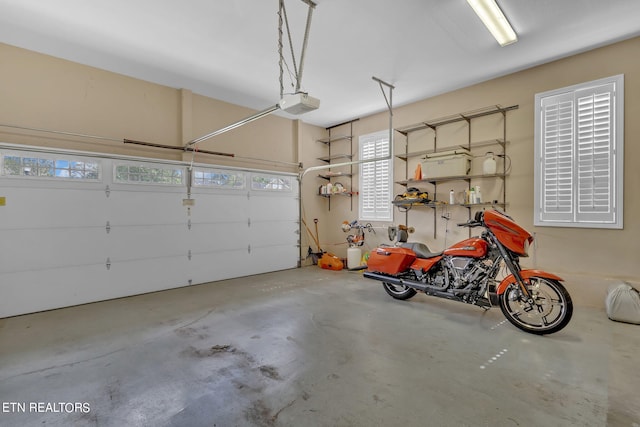 garage featuring a garage door opener