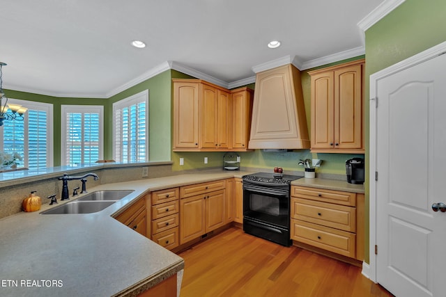 kitchen with premium range hood, sink, black range with electric cooktop, crown molding, and light hardwood / wood-style floors