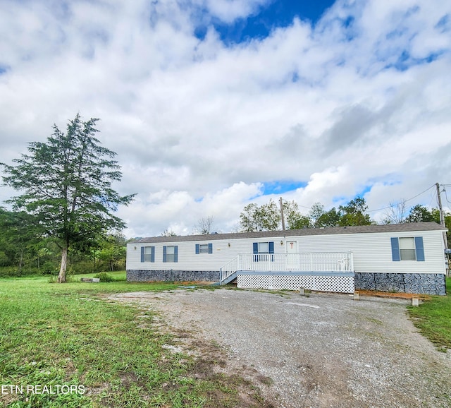 manufactured / mobile home featuring a deck