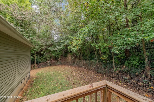 view of yard featuring a wooden deck