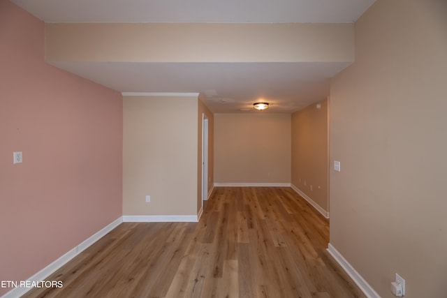 spare room featuring light hardwood / wood-style floors