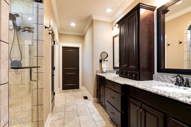 bathroom featuring an enclosed shower, crown molding, tile patterned floors, and vanity