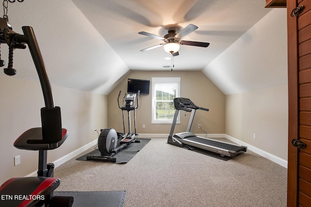 exercise room with carpet flooring, baseboards, a ceiling fan, and lofted ceiling