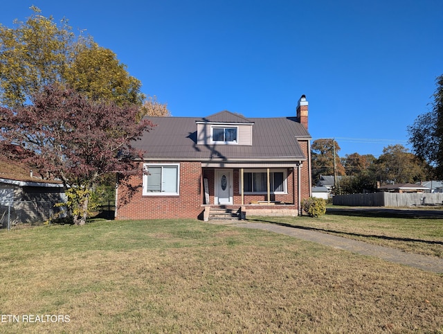 view of front of home with a porch and a front lawn