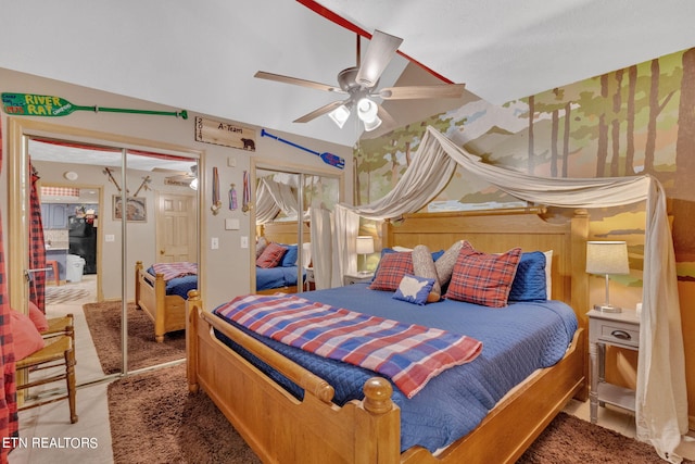 carpeted bedroom with ceiling fan and a closet