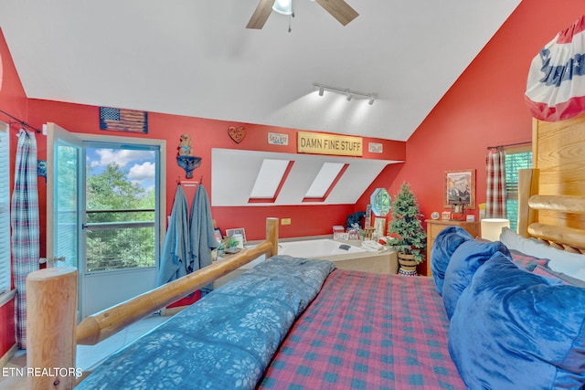 bedroom with tile patterned flooring, vaulted ceiling, ceiling fan, and rail lighting