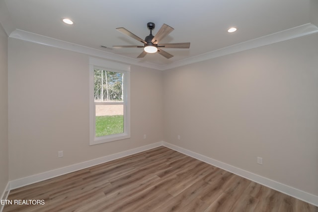 unfurnished room featuring crown molding, ceiling fan, and wood-type flooring