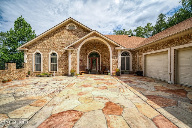 view of front of property featuring a garage