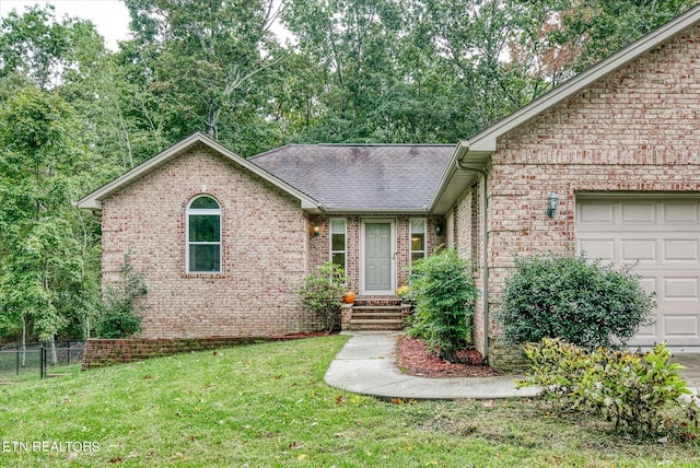 view of front of property with a front lawn