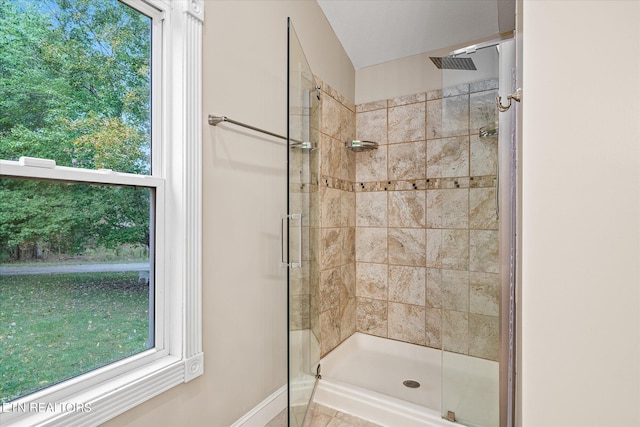 bathroom featuring an enclosed shower