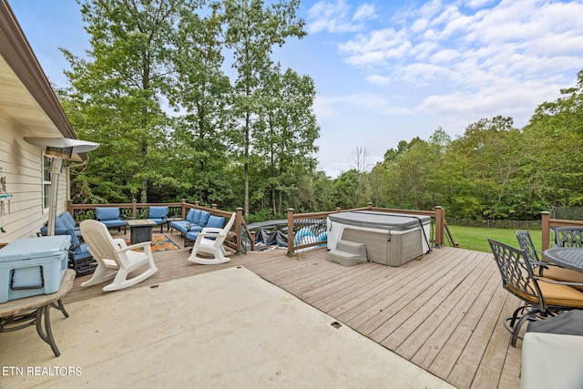 deck featuring a hot tub