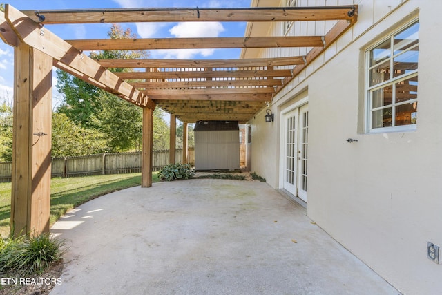 view of patio featuring a storage unit and french doors