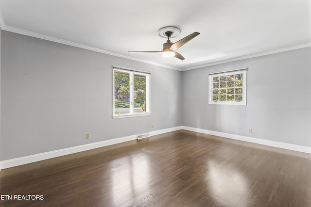 unfurnished room with ceiling fan, ornamental molding, plenty of natural light, and dark hardwood / wood-style floors