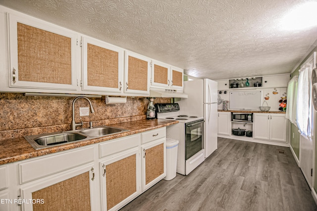 kitchen with white cabinetry, white electric range oven, light wood-type flooring, a textured ceiling, and sink