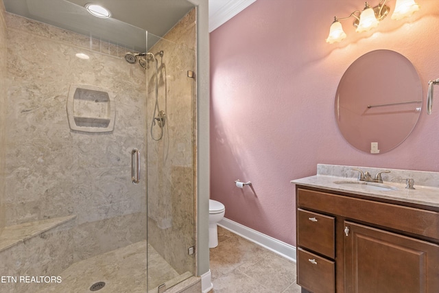 bathroom with tile patterned flooring, vanity, toilet, and an enclosed shower