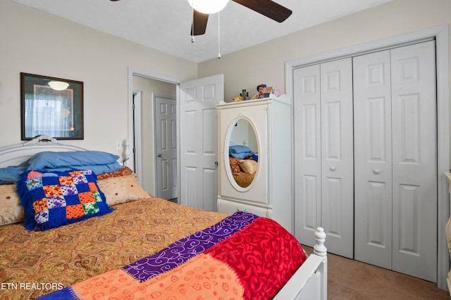 bedroom with ceiling fan, a closet, and carpet