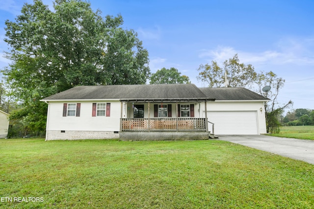 view of front facade featuring a garage, covered porch, and a front lawn