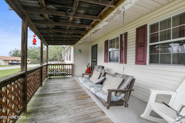 wooden deck with a porch