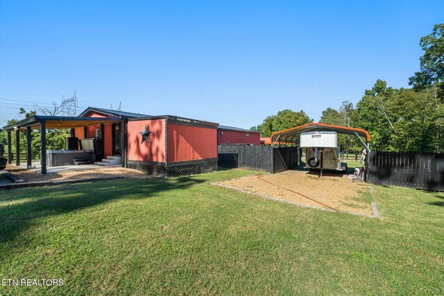 view of yard featuring a carport