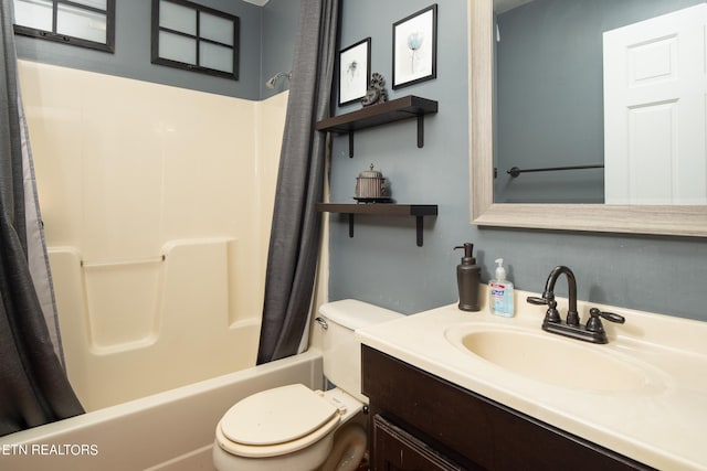 full bathroom with vanity, toilet, and shower / bathtub combination with curtain