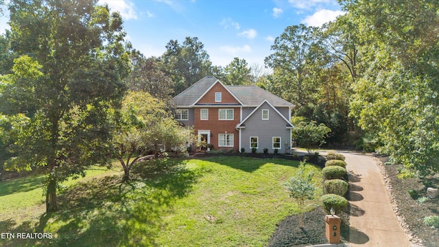 view of front of home with a front lawn