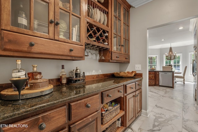 bar with dark stone countertops, dishwasher, hanging light fixtures, and a chandelier