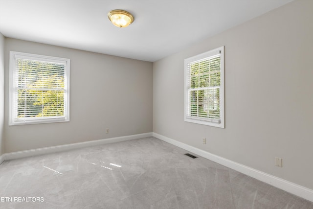 view of carpeted spare room