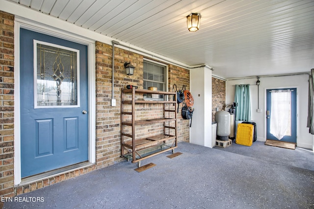 doorway to property featuring a porch