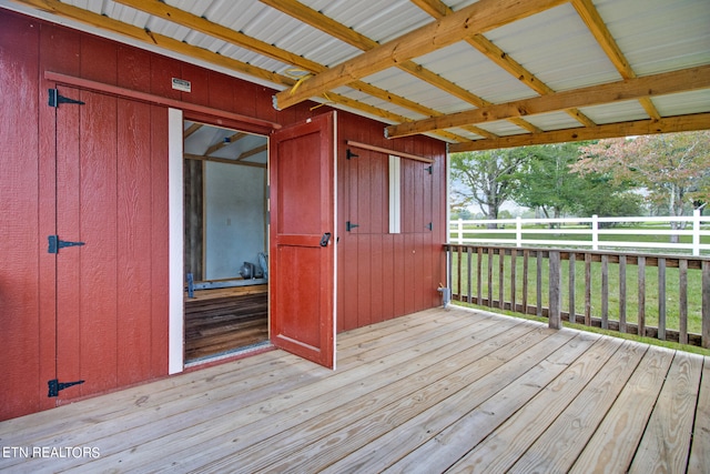 deck featuring an outdoor structure