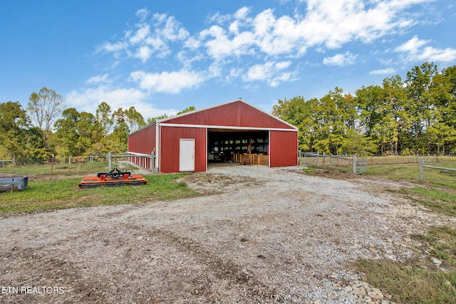 view of outdoor structure featuring a rural view