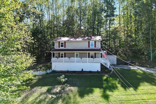 view of front of property with a front lawn