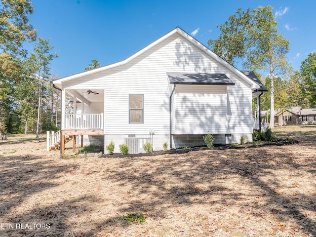 back of property featuring ceiling fan and central air condition unit