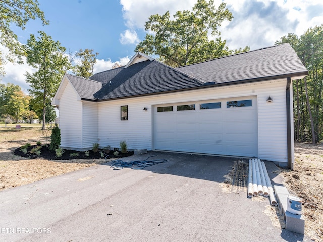 exterior space featuring a garage