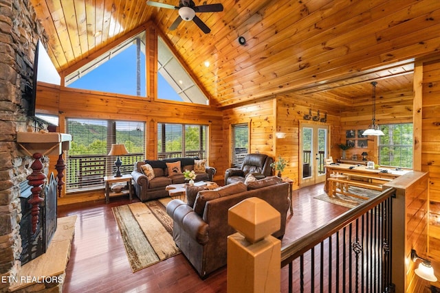 living room featuring wood-type flooring, plenty of natural light, high vaulted ceiling, and wooden ceiling