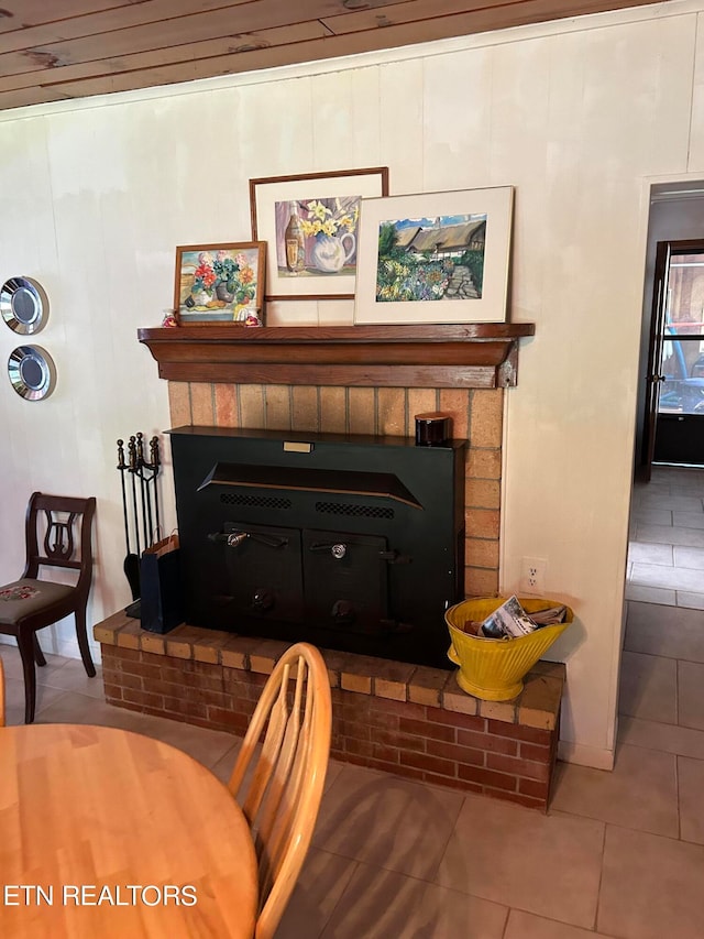 interior space with a fireplace and wood ceiling